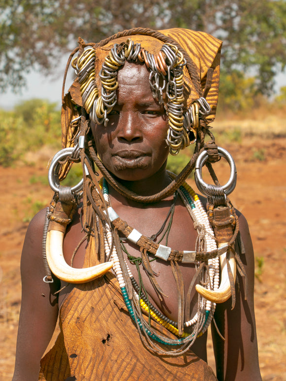 Decorated woman from the Mursi tribe at the Omo Valley of Ethiopia