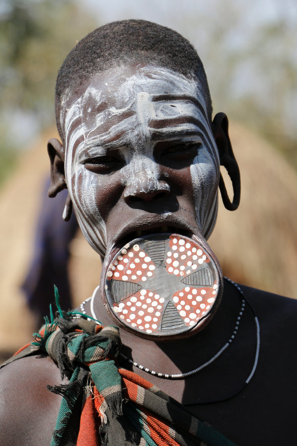 Mursi tribe. Woman with lip plate.